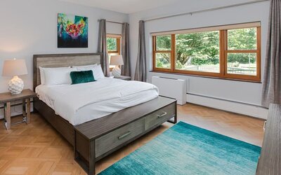 King bed at SKYLARANNA Resort & Spa.