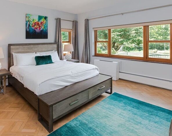 King bed at SKYLARANNA Resort & Spa.