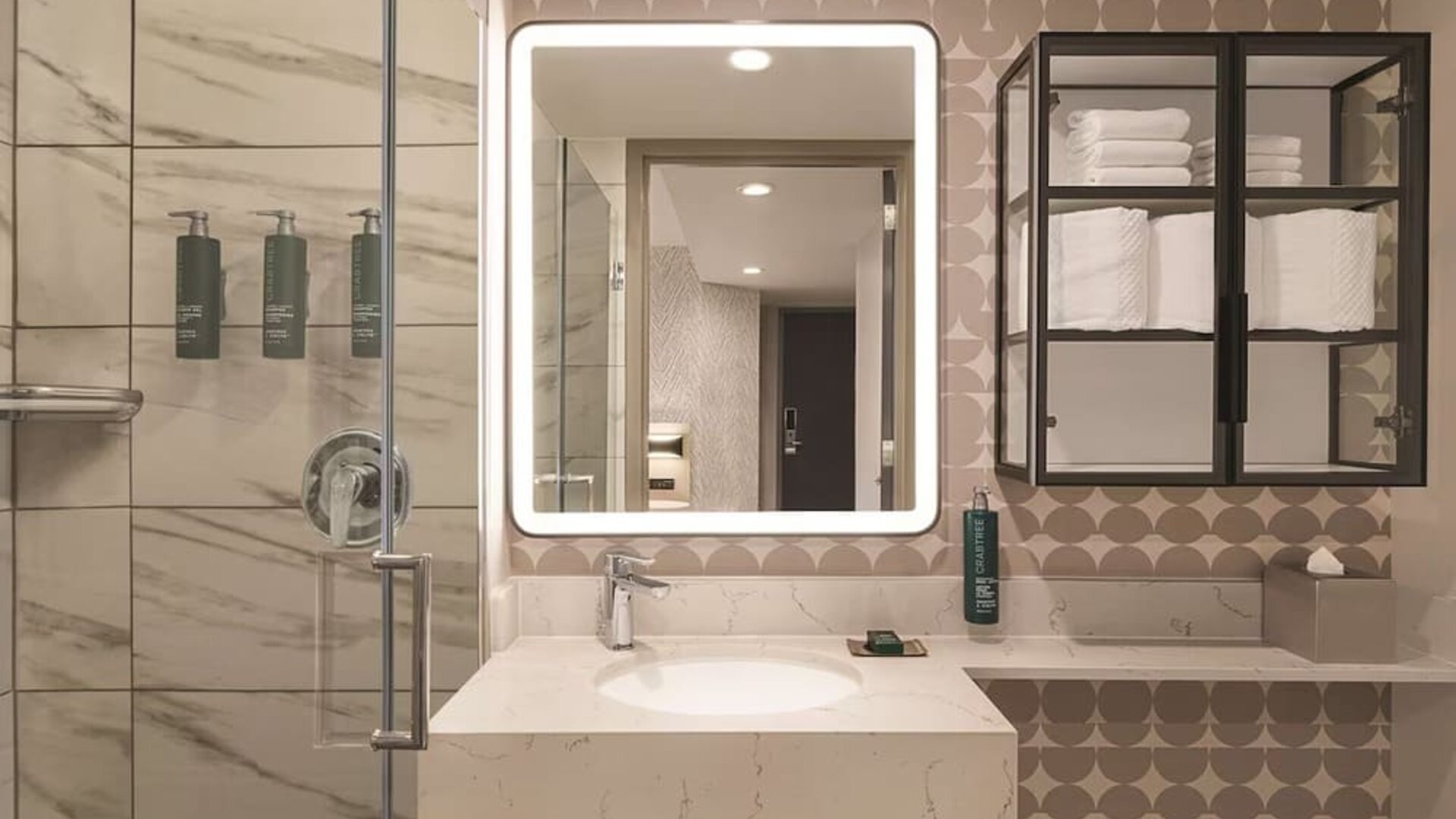 Private guest bathroom with shower and free toiletries at DoubleTree By Hilton New York Midtown Fifth Ave.