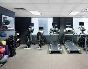 Fully equipped fitness center at DoubleTree By Hilton New York Midtown Fifth Ave.