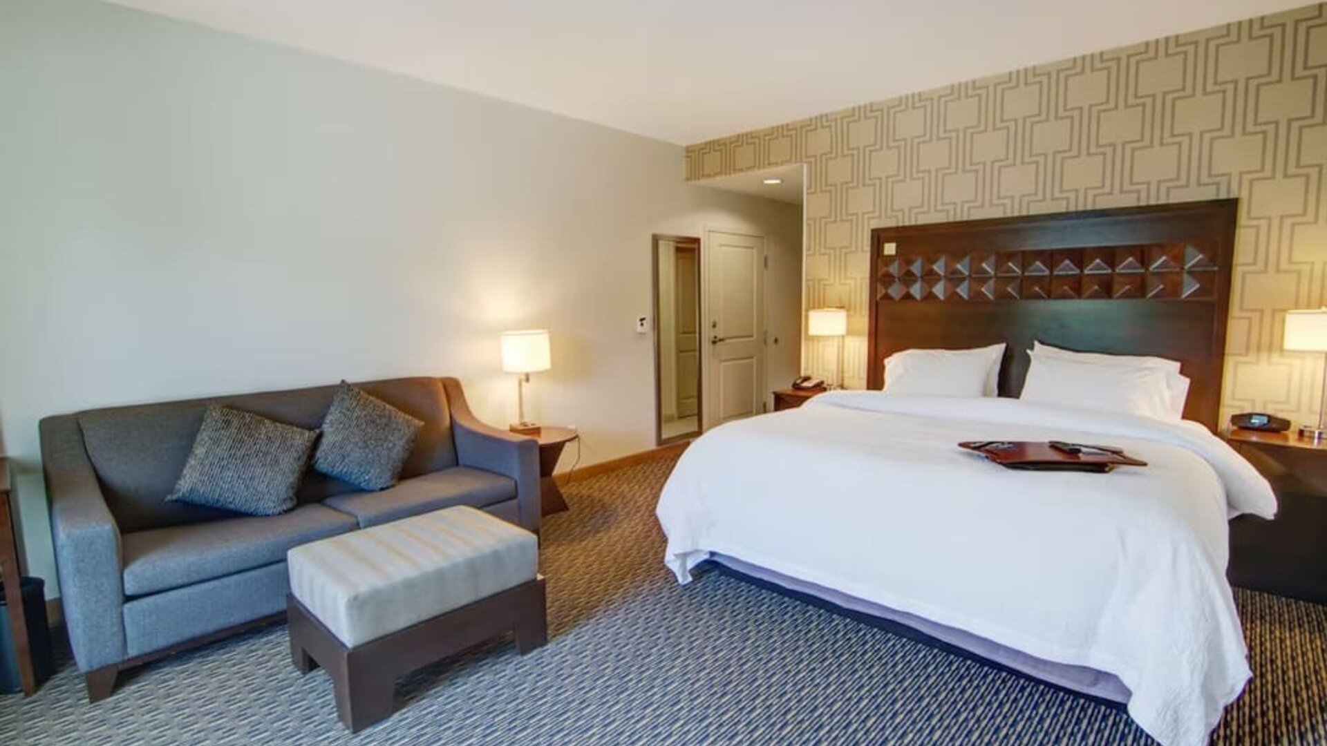 King room with sofa and private bathroom at Hampton Inn & Suites Trophy Club - Fort Worth North, TX.