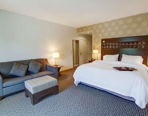 King room with sofa and private bathroom at Hampton Inn & Suites Trophy Club - Fort Worth North, TX.