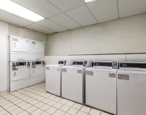 Laundry room is available for guests at Red Roof PLUS+ & Suites Houston - IAH Airport SW.