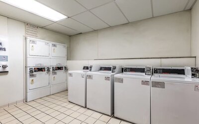 Laundry room is available for guests at Red Roof PLUS+ & Suites Houston - IAH Airport SW.