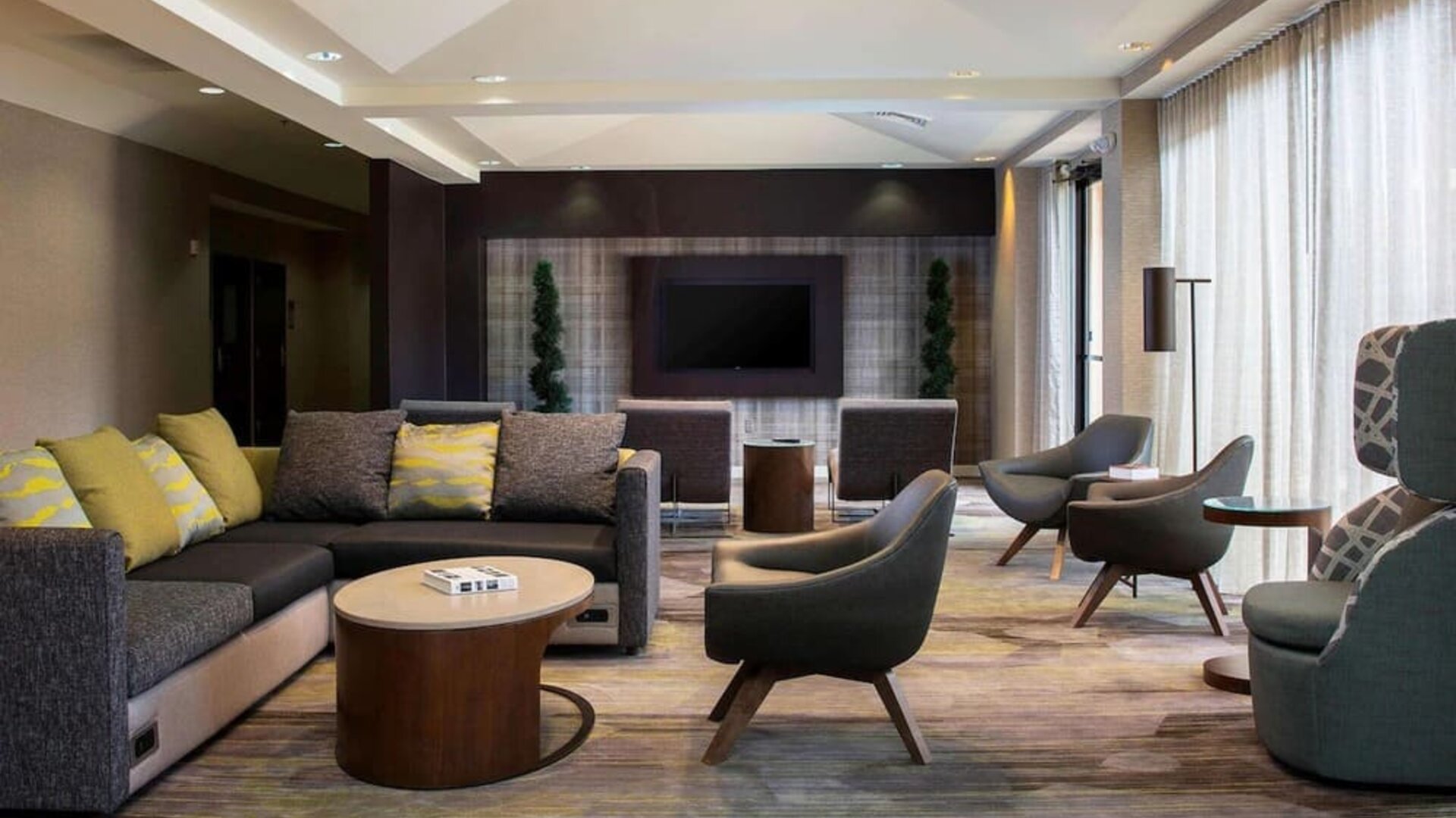 Lobby lounge area with comfortable seating at Sonesta Select Atlanta Norcross I-85.
