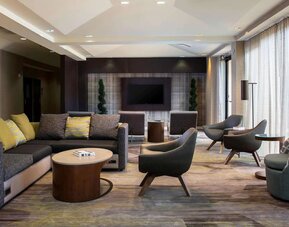 Lobby lounge area with comfortable seating at Sonesta Select Atlanta Norcross I-85.