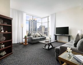 King room with lounge at Millennium Hotel Broadway Times Square.