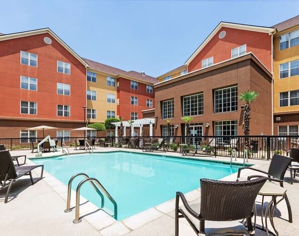 Outdoor pool at Homewood Suites By Hilton Shreveport.