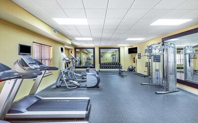Fitness center at Homewood Suites By Hilton Shreveport.