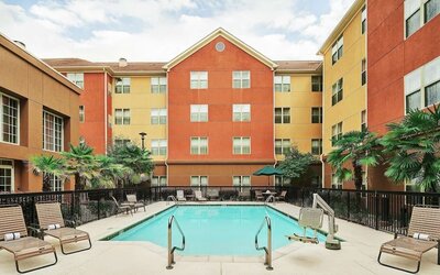 Outdoor pool at Homewood Suites By Hilton Shreveport.