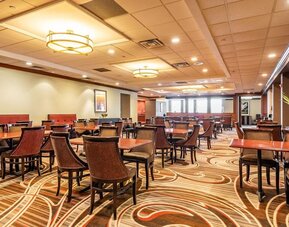 Dining area with comfortable seating at Wyndham Omaha.