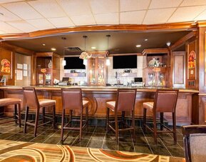 On-site bar and restaurant at Wyndham Omaha. 