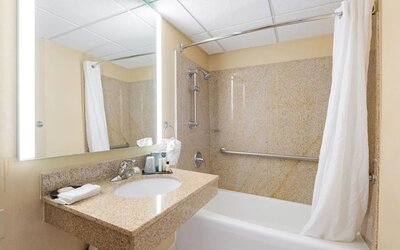 Private guest bathroom with free toiletries at Wyndham Omaha.