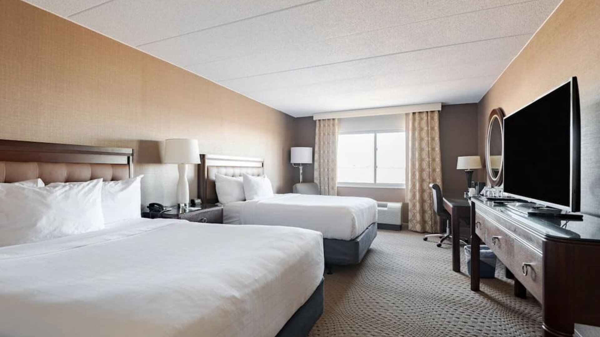 Day use twin room with work desk and private bathroom at Wyndham Omaha.