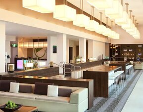 Lounge area and workspace at Element Miami International Airport.