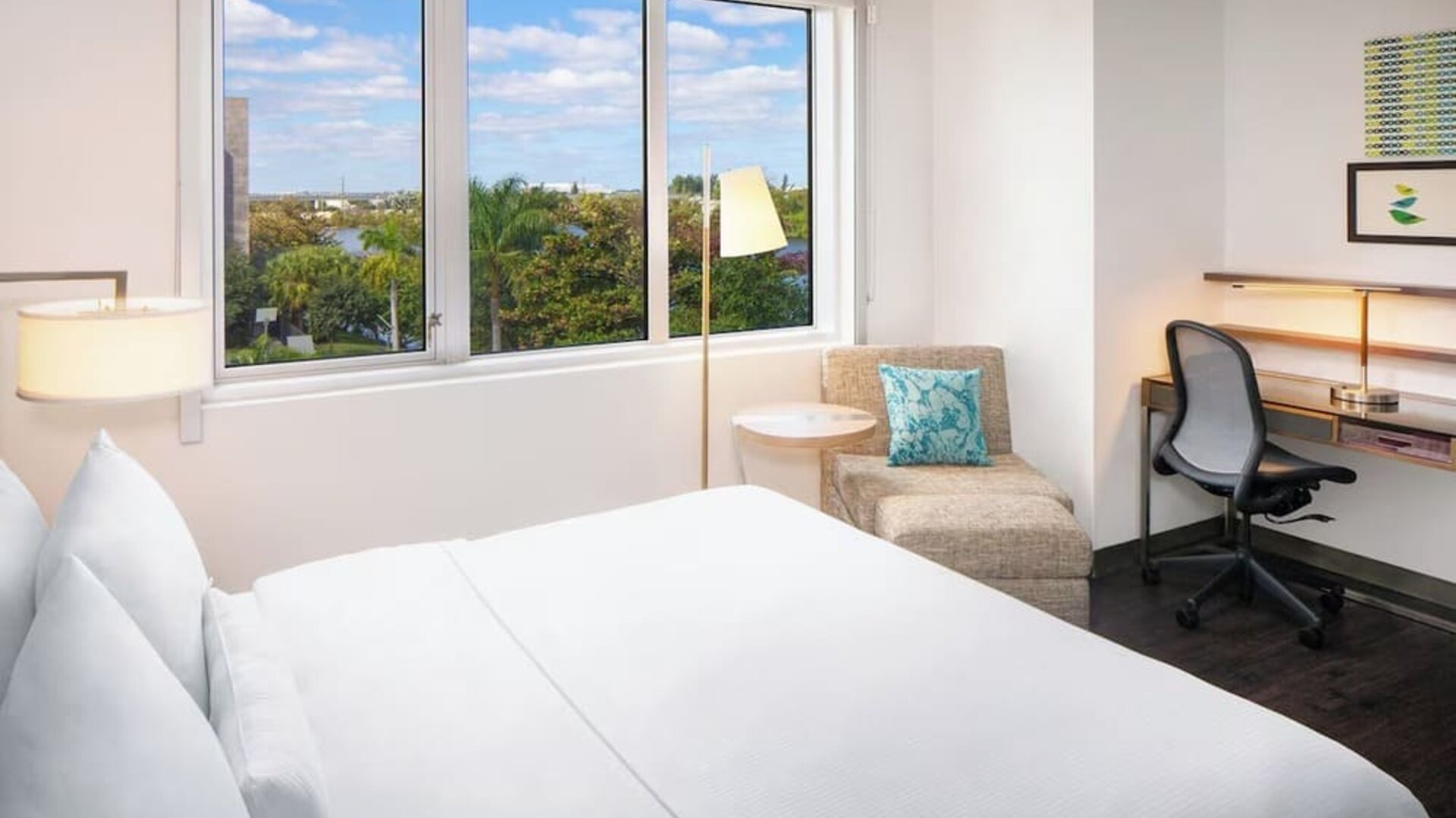 Day use room with work desk at Element Miami International Airport.