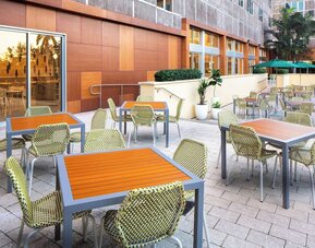 Outdoor dining area at Element Miami International Airport.