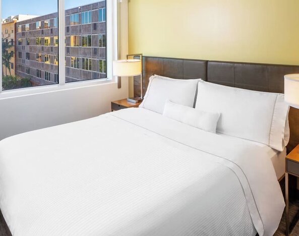 King bed at Element Miami International Airport.