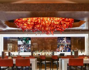 On-site bar at Hilton Dallas/ Plano Granite Park.