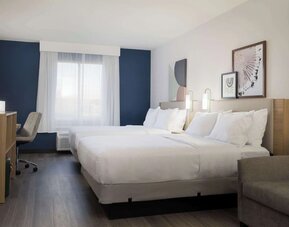 Day use room with queen beds and tv at Spark By Hilton Guelph.