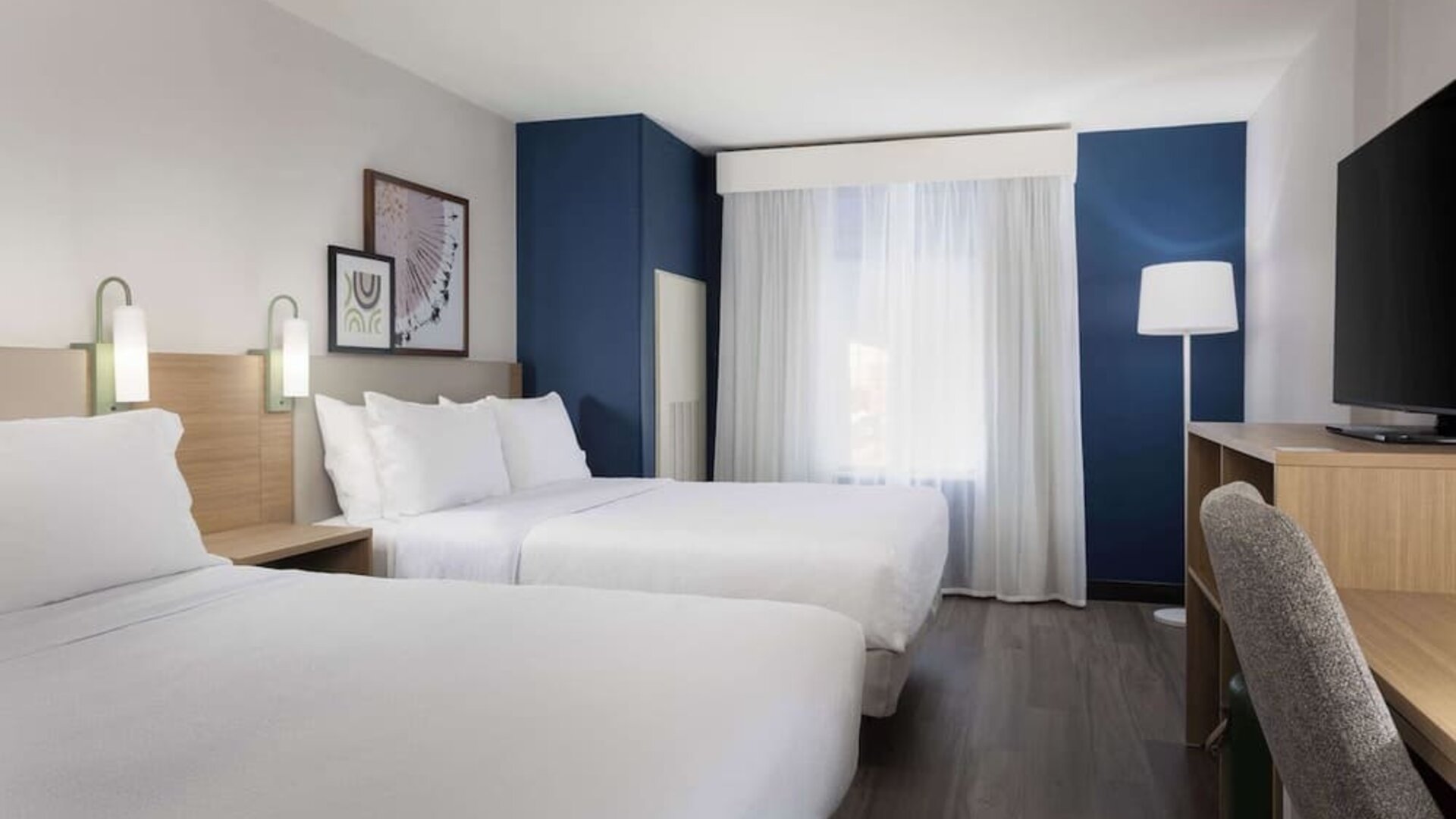 Day use room with queen beds and tv at Spark By Hilton Guelph.