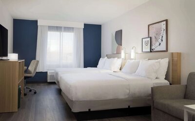Day use room with queen beds at Spark By Hilton Guelph.