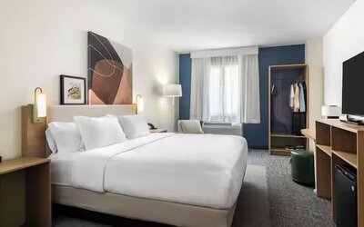 Day use room with king bed at Spark By Hilton Guelph.