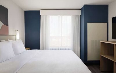 Day use room with king bed at Spark By Hilton Guelph.