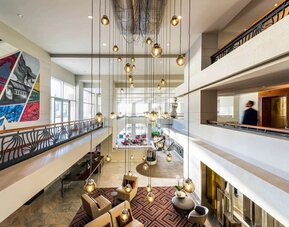 Lobby and coworking lounge at Pullman Miami Airport.