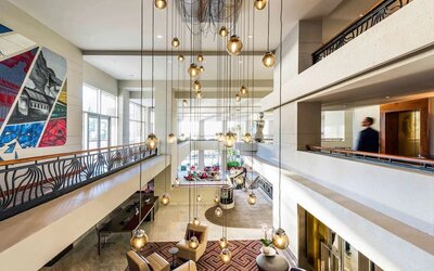 Lobby and coworking lounge at Pullman Miami Airport.