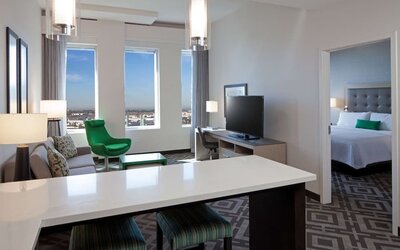Day use room with living area at Homewood Suites By Hilton LAX Airport.
