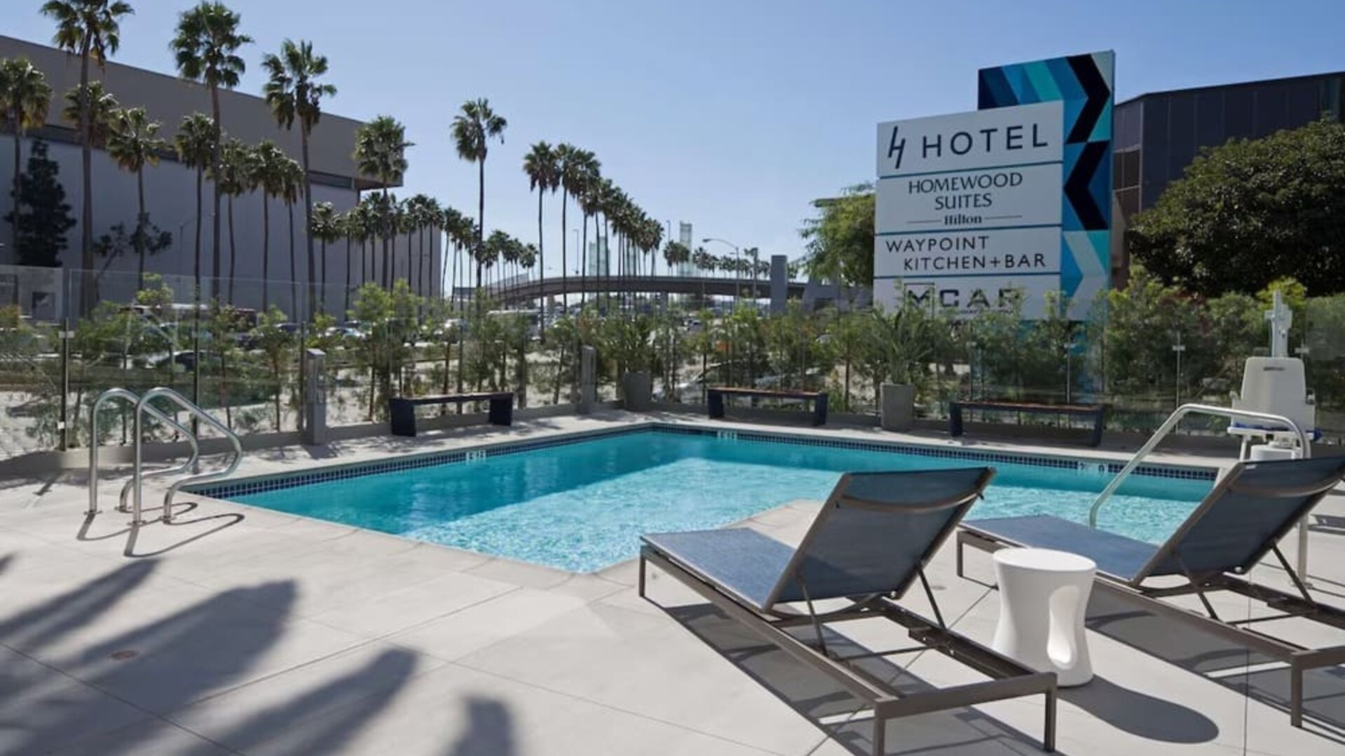 Refreshing outdoor pool at Homewood Suites By Hilton LAX Airport.