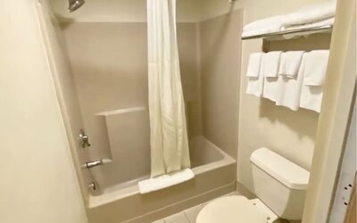 Guest bathroom at Hibiscus Inn & Suites.