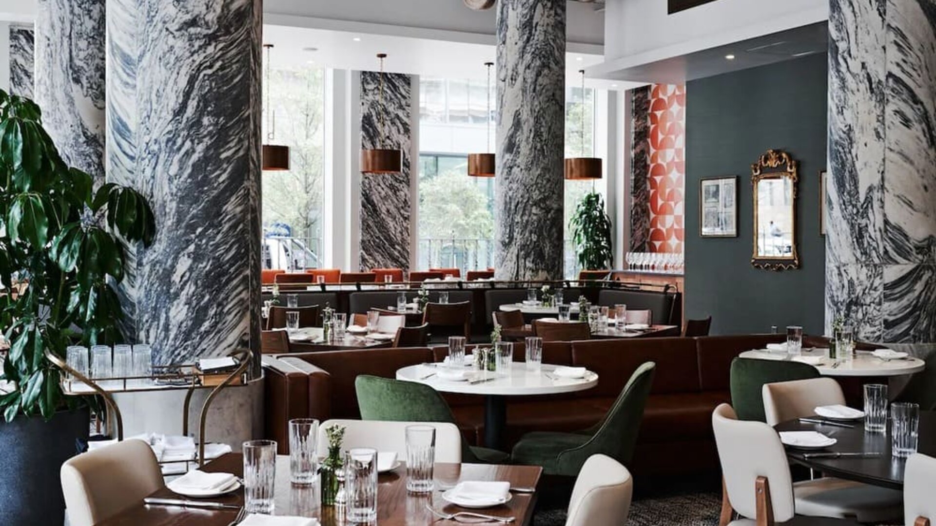 Dining area with natural light perfect for coworking at The Candler Hotel Atlanta, Curio Collection By Hilton.