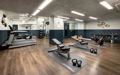Well equipped fitness center at The Candler Hotel Atlanta, Curio Collection By Hilton.