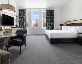 Spacious day use room at The Candler Hotel Atlanta, Curio Collection By Hilton.