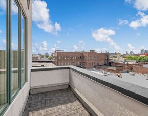 Outdoor patio at Aura Hotel Brooklyn.