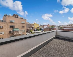 Outdoor patio at Aura Hotel Brooklyn.