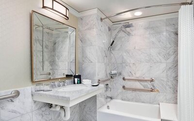 Private guest bathroom with shower and tub at The Westin Philadelphia.