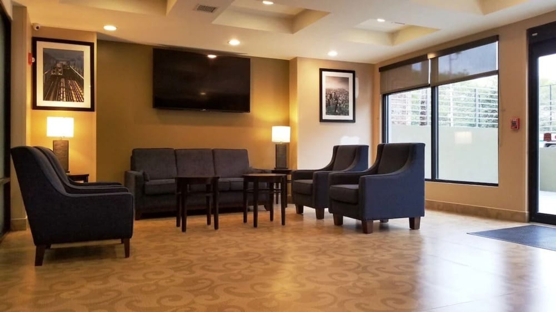Lobby lounge area at Days Inn By Wyndham Brooklyn Marine Park.