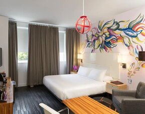 King bed with workspace and private bathroom at Nu Hotel - Brooklyn.