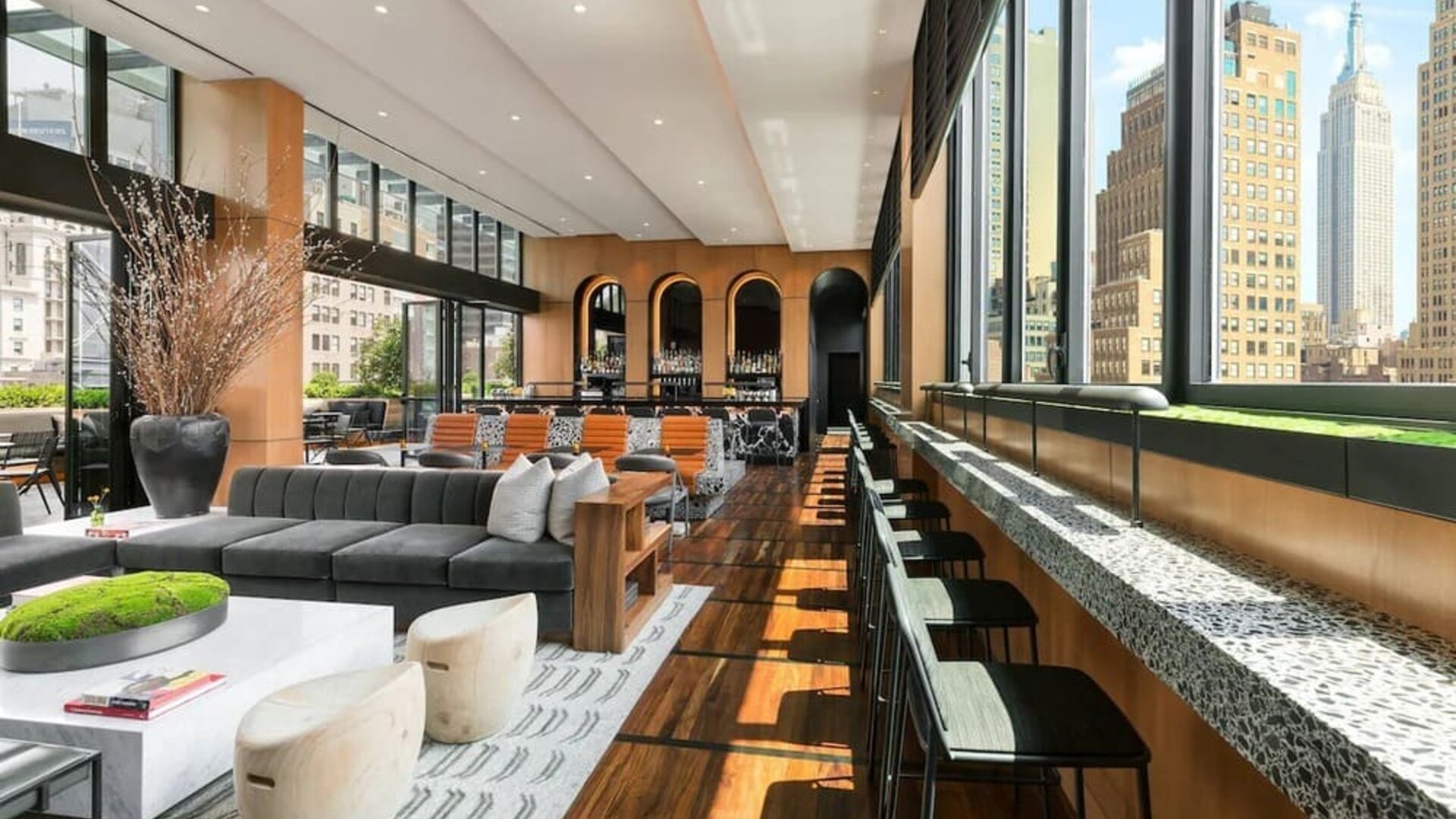 Lounge area with comfortable seating, perfect for coworking at AC Hotel New York Times Square.