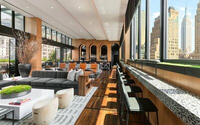 Lounge area with comfortable seating, perfect for coworking at AC Hotel New York Times Square.
