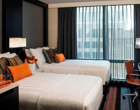 Day use twin room with work desk and private bathroom at Courtyard By Marriott New York Manhattan/Central Park.