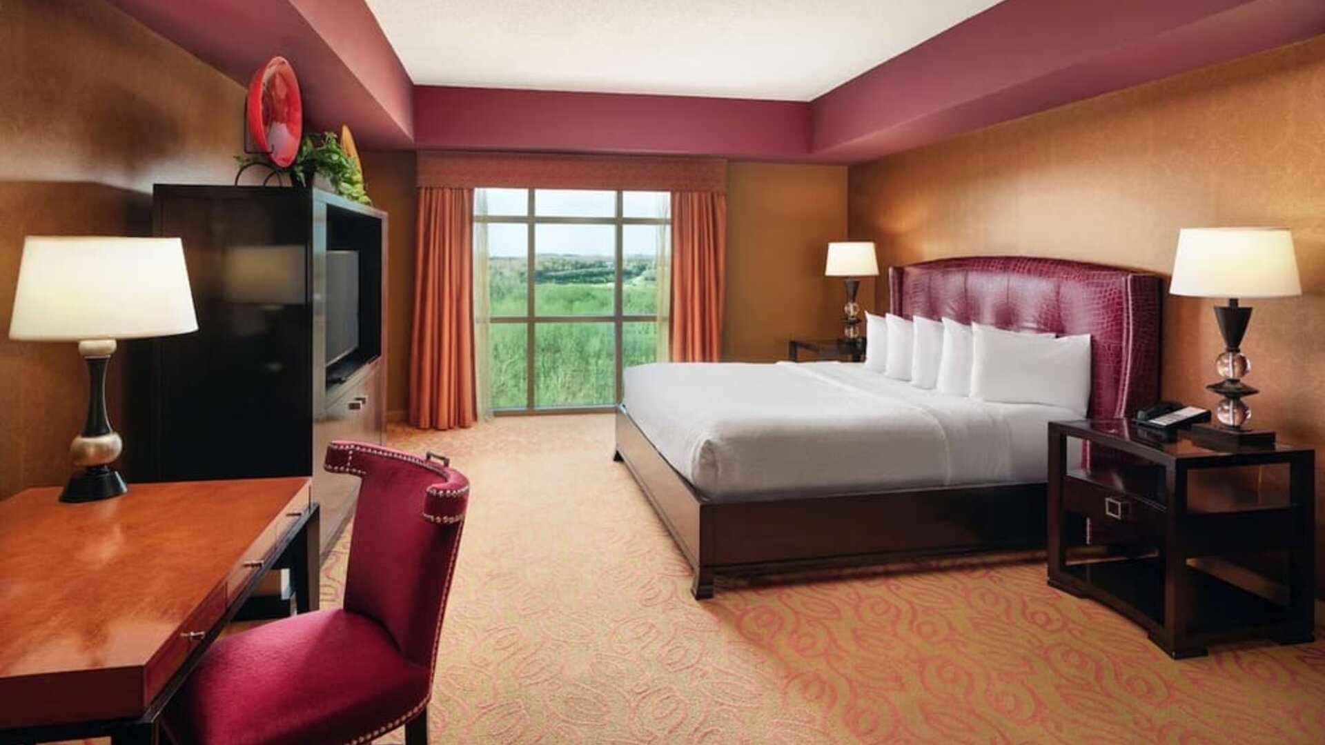 Day use room with work desk and natural light at Embassy Suites By Hilton Charlotte-Concord-Golf Resort & Spa.