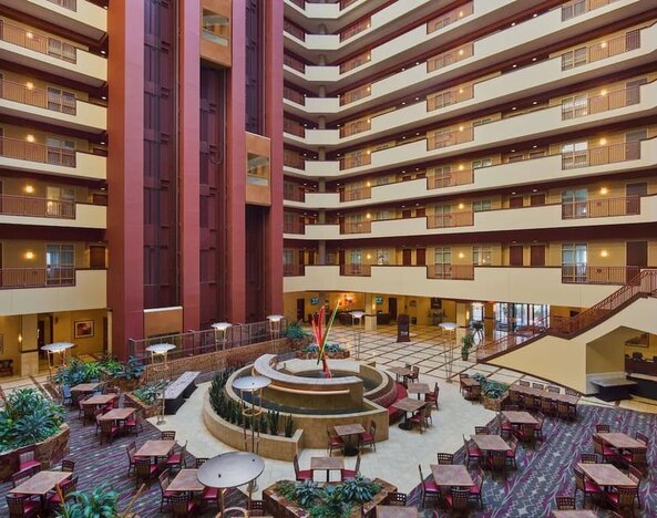 Coworking and lounge area at Embassy Suites By Hilton Charlotte-Concord-Golf Resort & Spa.