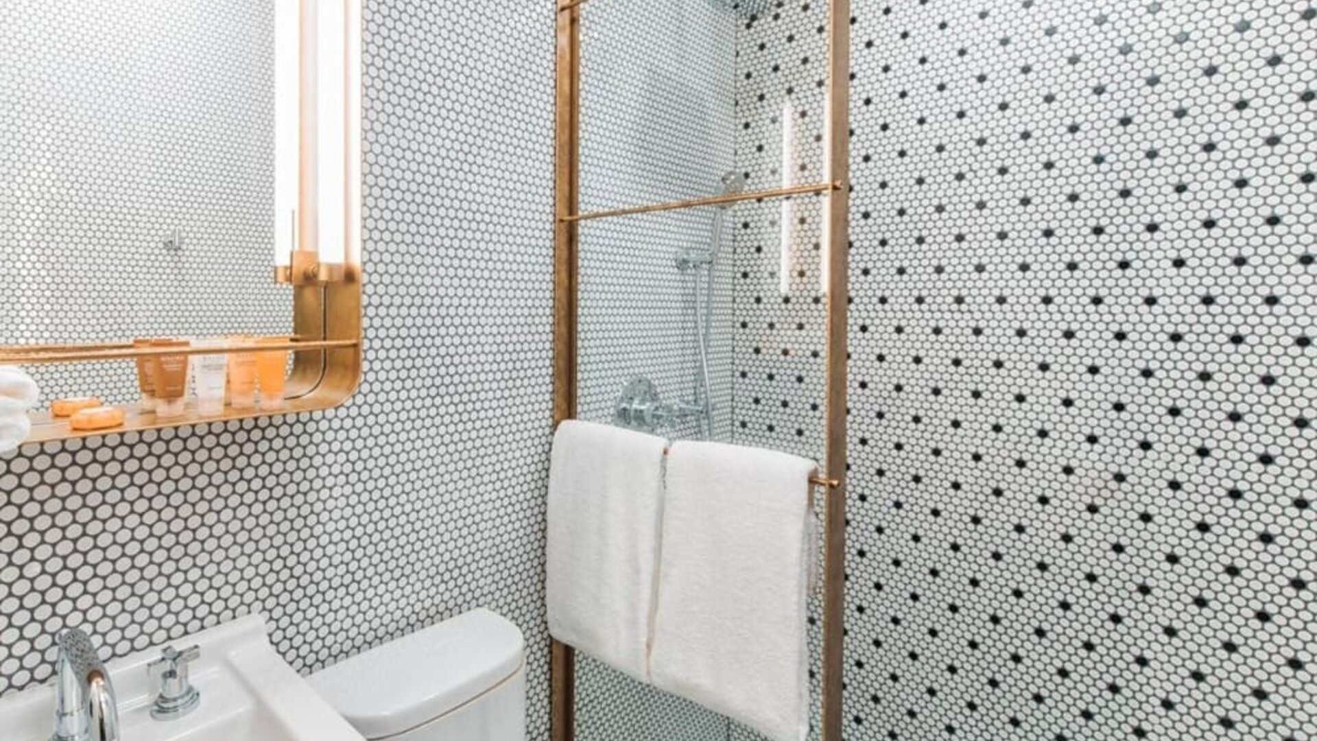 Private guest bathroom with shower at Hotel Shocard NYC.