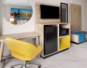 Day use rooms include work desk, mini-bar, TV screen and microwave at Days Inn By Wyndham Staten Island.