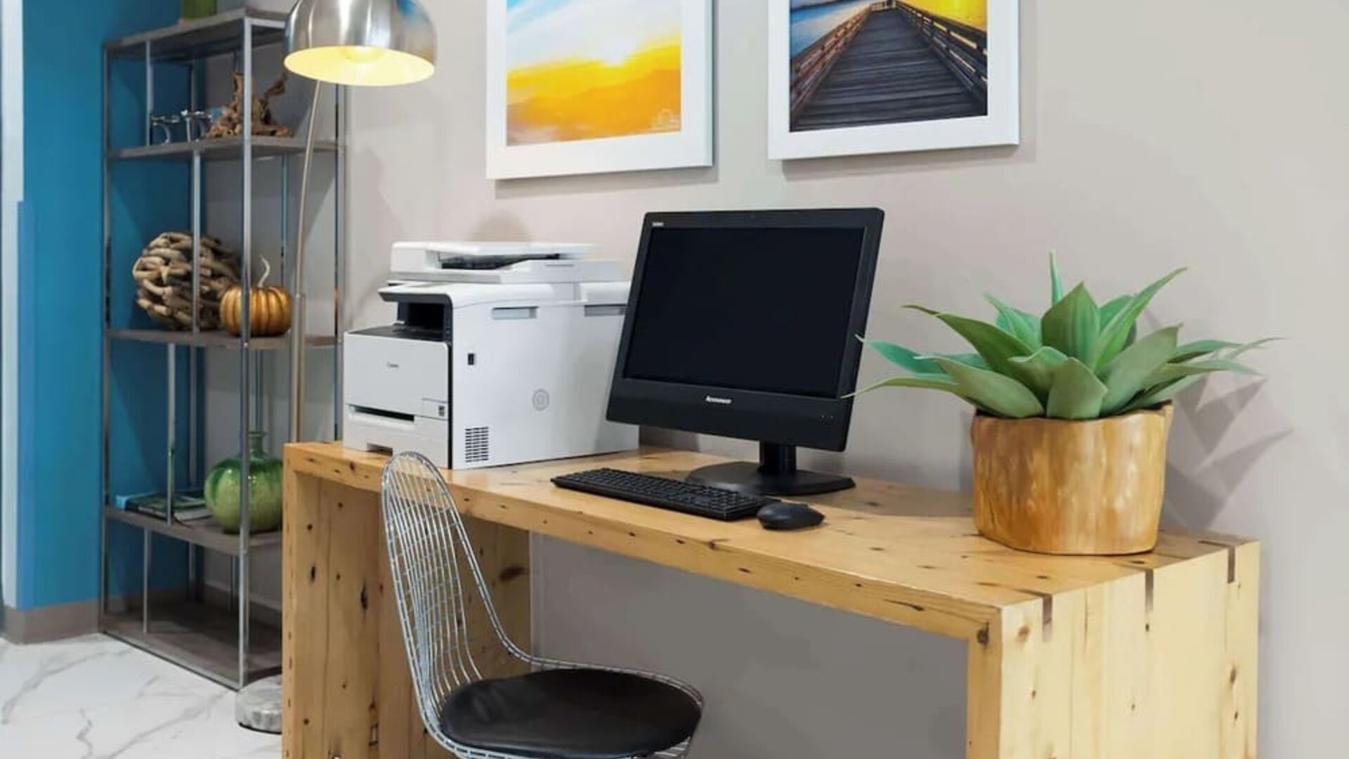 Business center with computer and printer at Days Inn By Wyndham Staten Island.