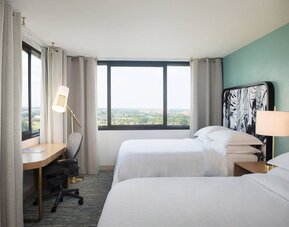 Day use twin room with work desk and private bathroom at Sheraton Miami Airport Hotel.